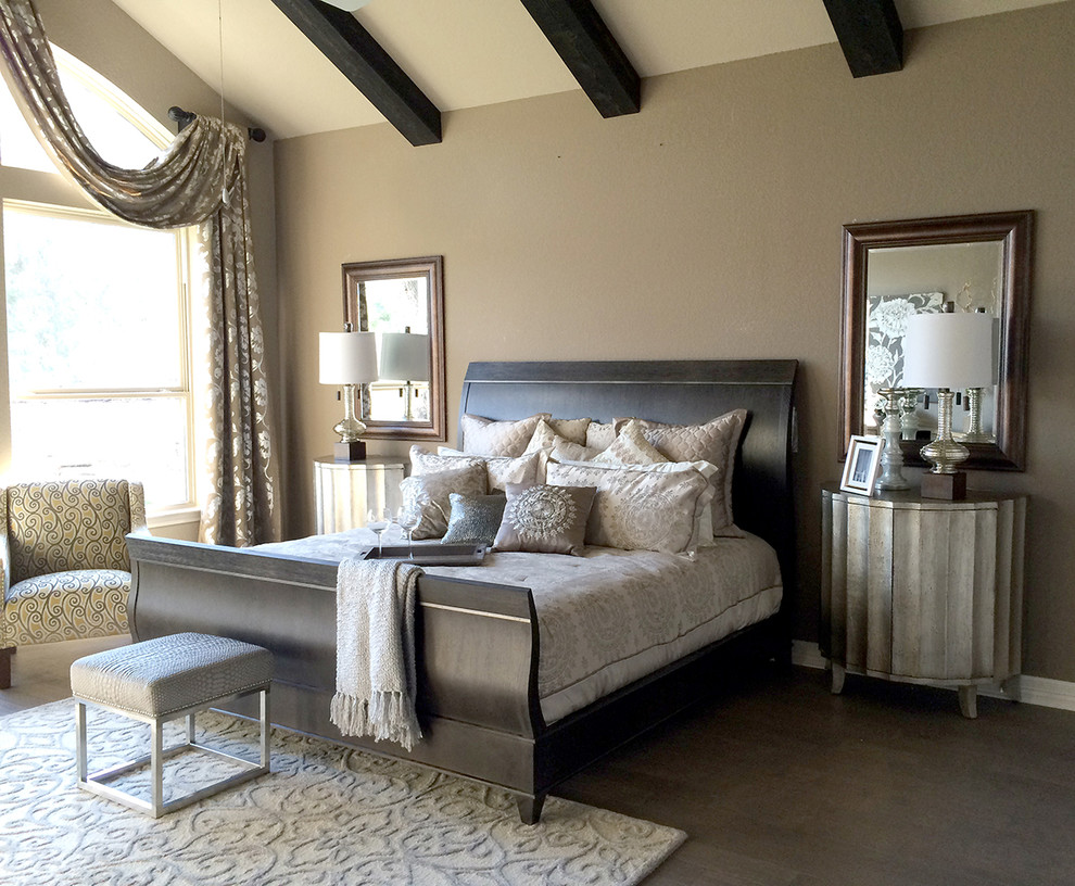 Bedroom - contemporary master medium tone wood floor bedroom idea in Houston with beige walls