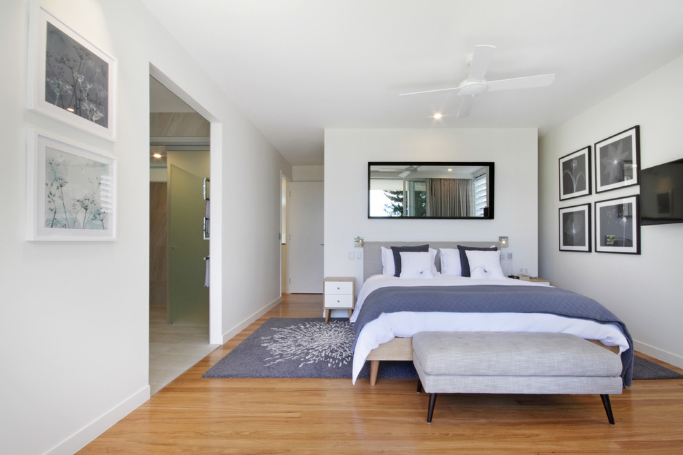 Mid-sized beach style master bedroom in Sunshine Coast.