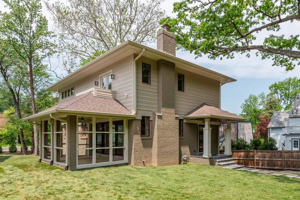 Inspiration for a mid-sized transitional beige two-story mixed siding gable roof remodel in DC Metro with a shingle roof