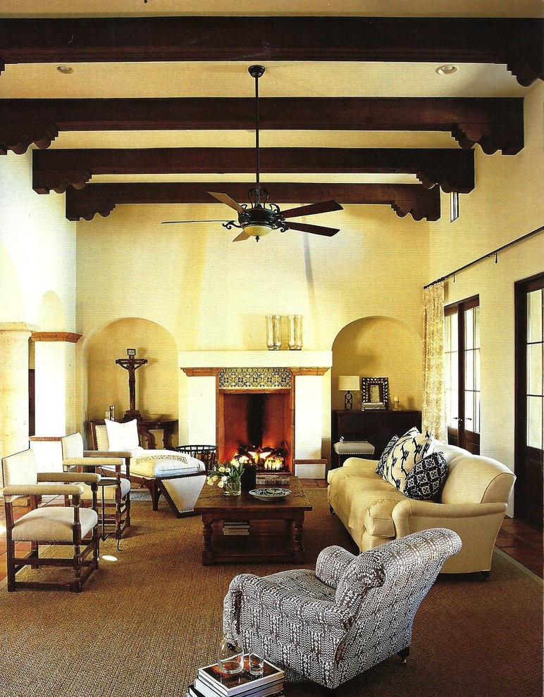 Design ideas for a large country open concept living room in Phoenix with beige walls, carpet, a standard fireplace, a tile fireplace surround and no tv.