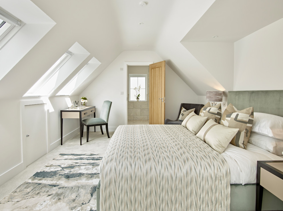 Transitional bedroom in Sussex.