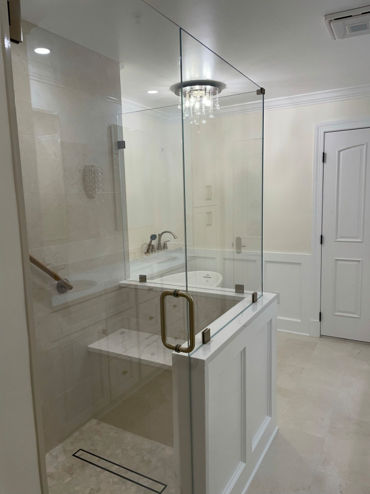 Design ideas for an expansive modern master bathroom in DC Metro with a corner shower, white tile, travertine, beige walls, travertine floors, beige floor and a hinged shower door.