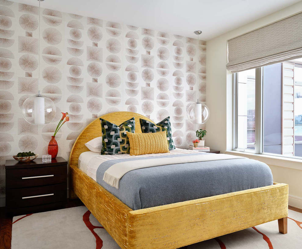 This is an example of a mid-sized contemporary bedroom in Boston with wallpaper.