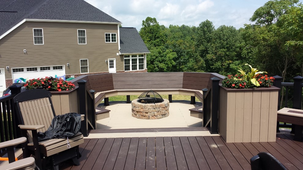 Deck - large modern backyard deck idea with a fire pit and no cover