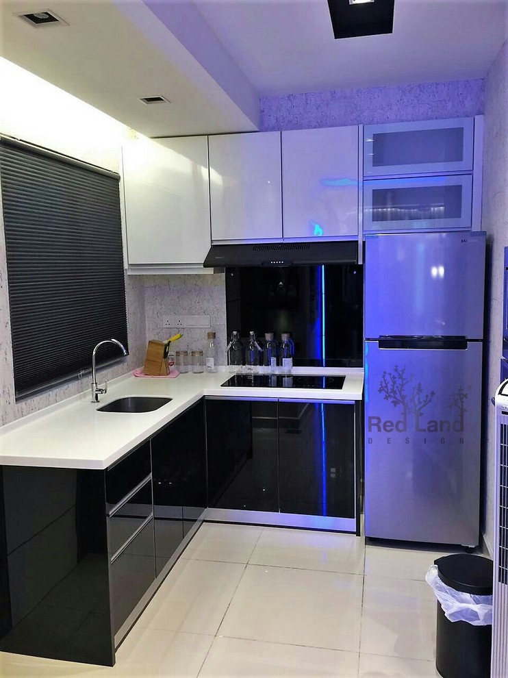 Photo of a small contemporary l-shaped separate kitchen in Other with a drop-in sink, beaded inset cabinets, white cabinets, quartzite benchtops, glass sheet splashback, stainless steel appliances, ceramic floors, no island and white floor.