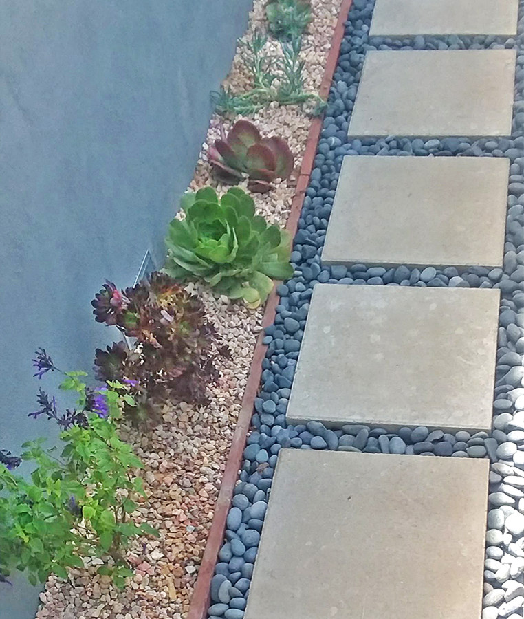 Concrete Paver Walkway with River Rocks Los Angeles by Flores