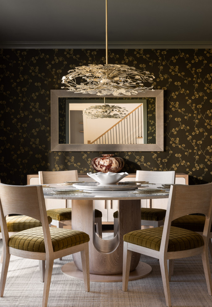 Example of a mid-sized transitional medium tone wood floor and wallpaper enclosed dining room design in New York