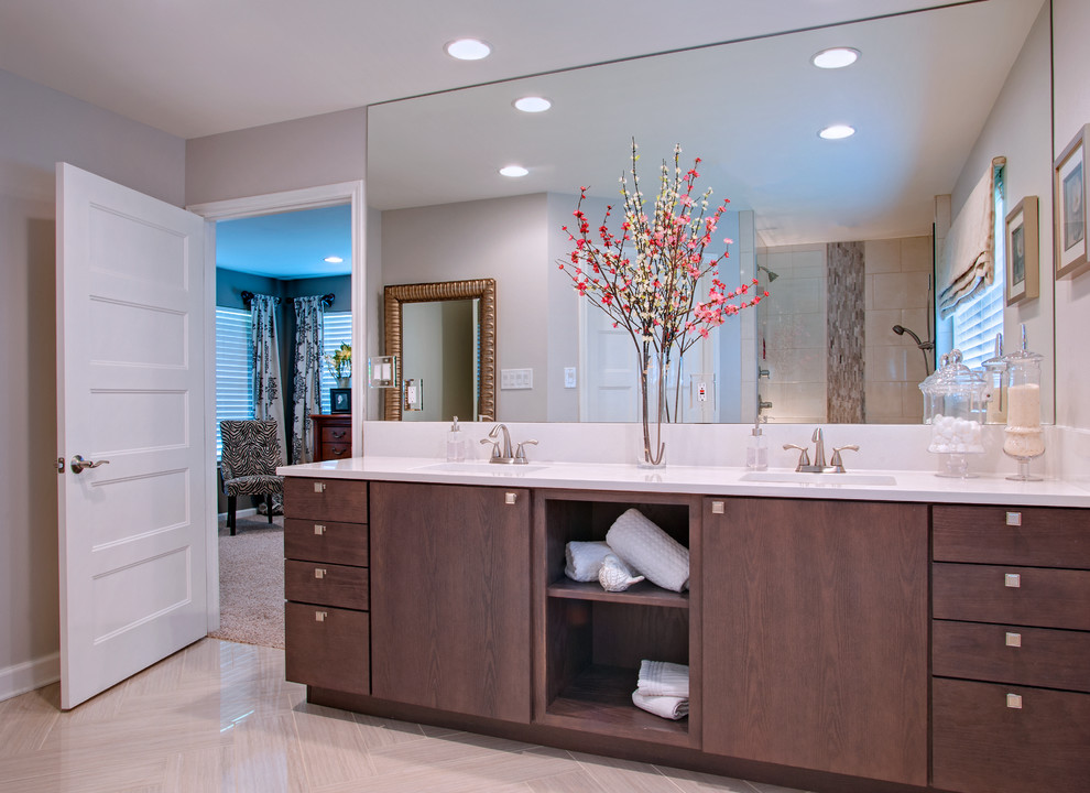 Photo of a large contemporary ensuite bathroom in Austin with flat-panel cabinets, dark wood cabinets, white tiles, ceramic tiles, white walls, porcelain flooring, a built-in sink and engineered stone worktops.