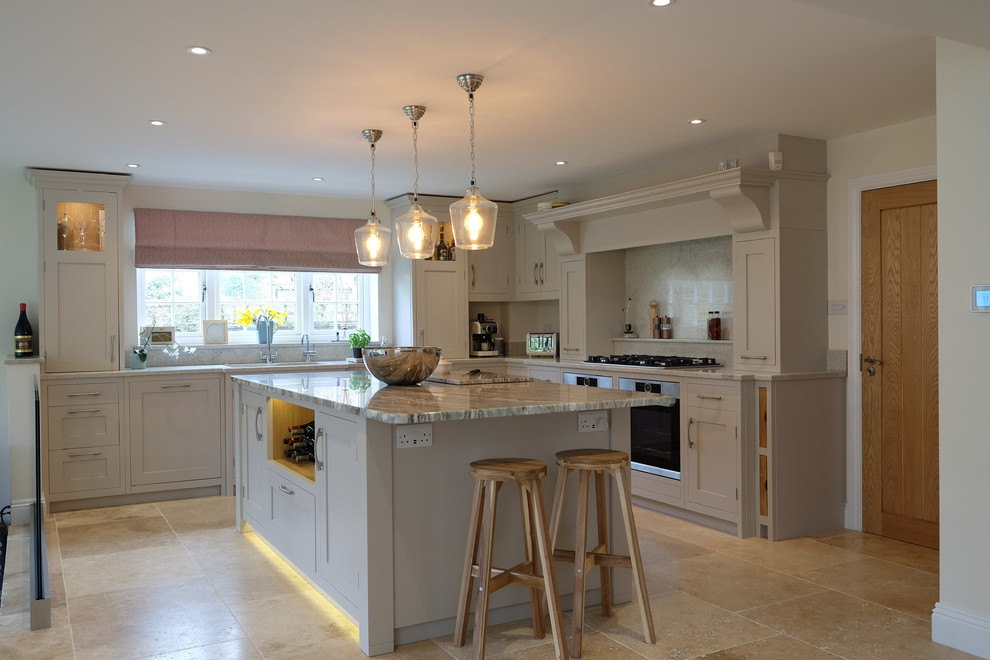 Design ideas for a large contemporary l-shaped open plan kitchen in Hampshire with an undermount sink, shaker cabinets, grey cabinets, granite benchtops, multi-coloured splashback, stone slab splashback, stainless steel appliances, limestone floors, with island, multi-coloured floor and multi-coloured benchtop.