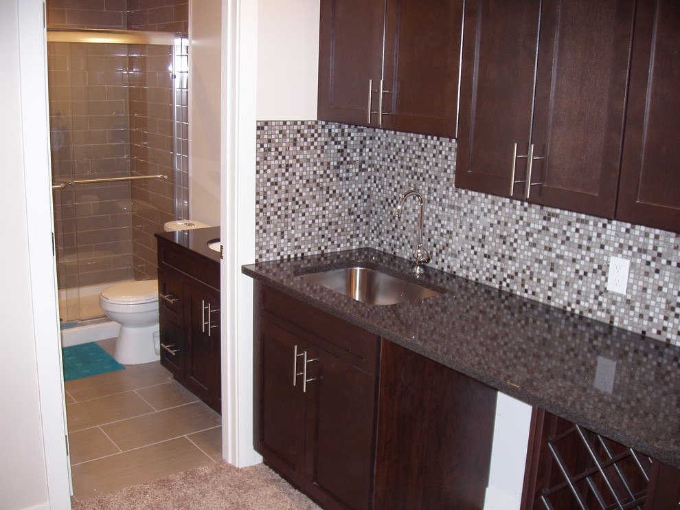 Example of a transitional bathroom design in Calgary