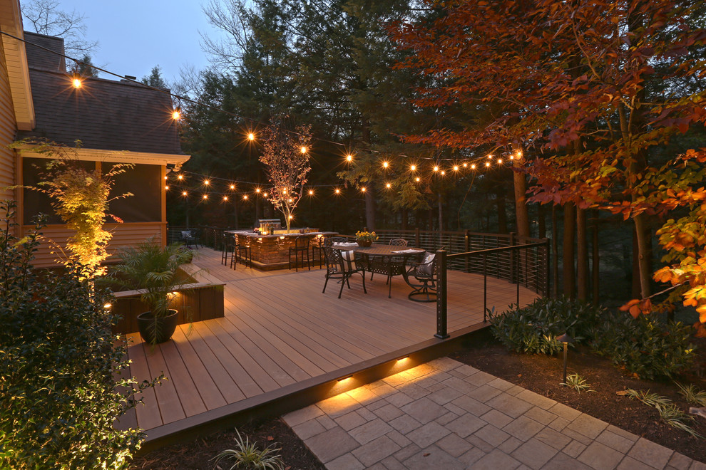 Inspiration for a mid-sized eclectic backyard deck in Other with an outdoor kitchen and no cover.