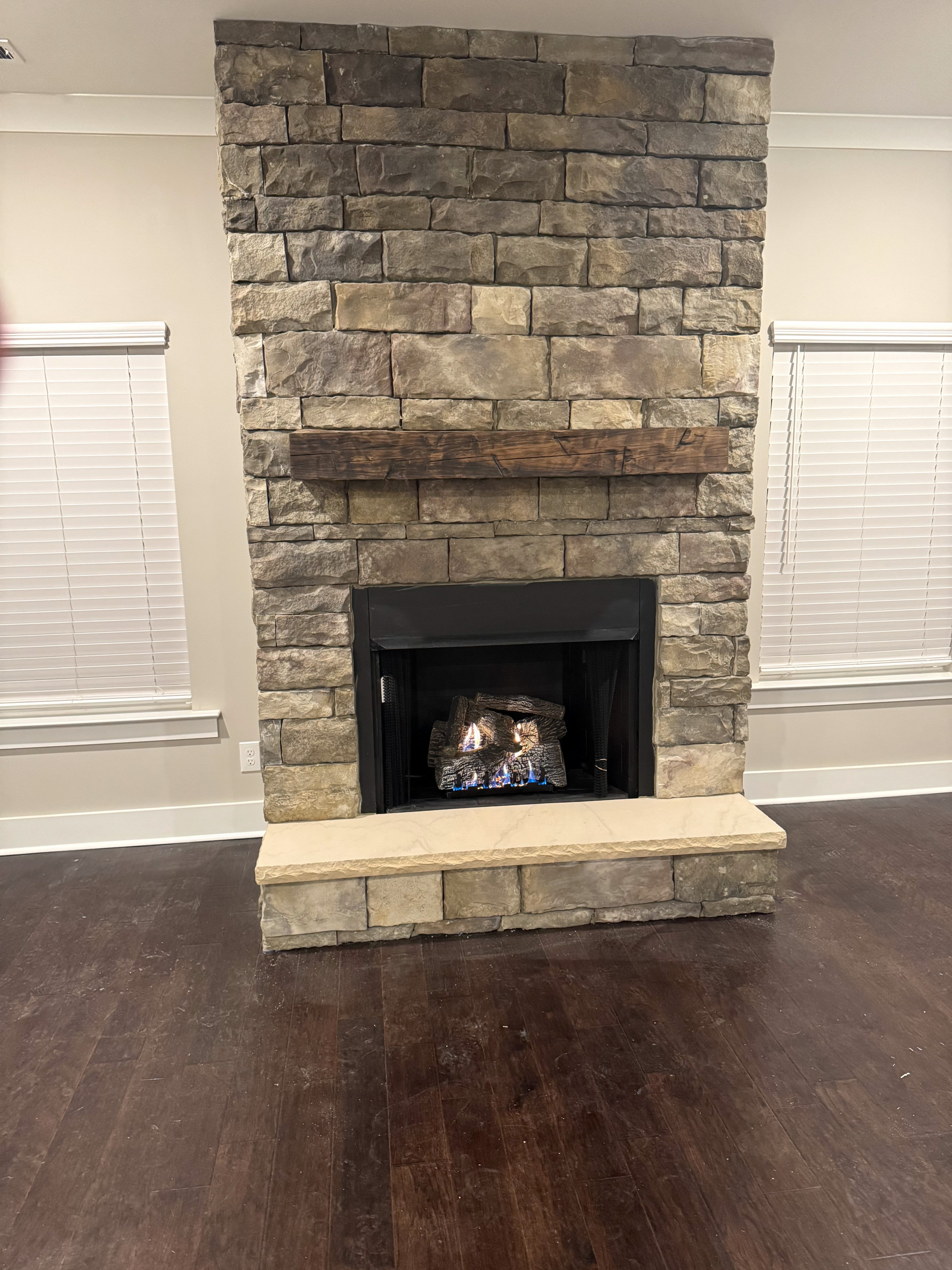"The Toast Zone" -  Installing a gas fireplace with stonework.
