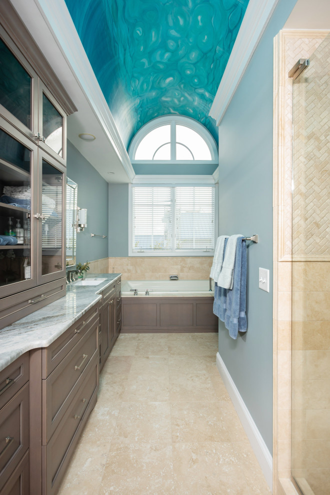 Large beach style master bathroom in Other with a double vanity and a built-in vanity.
