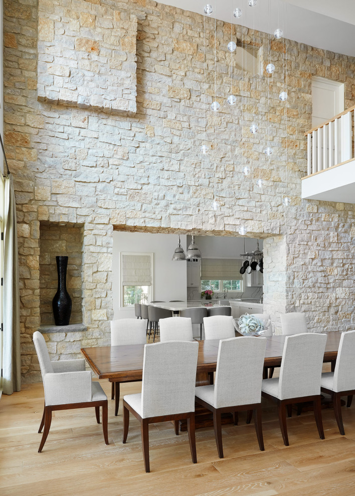 Lakehouse Lux - Example of a beach style dining room design in Chicago