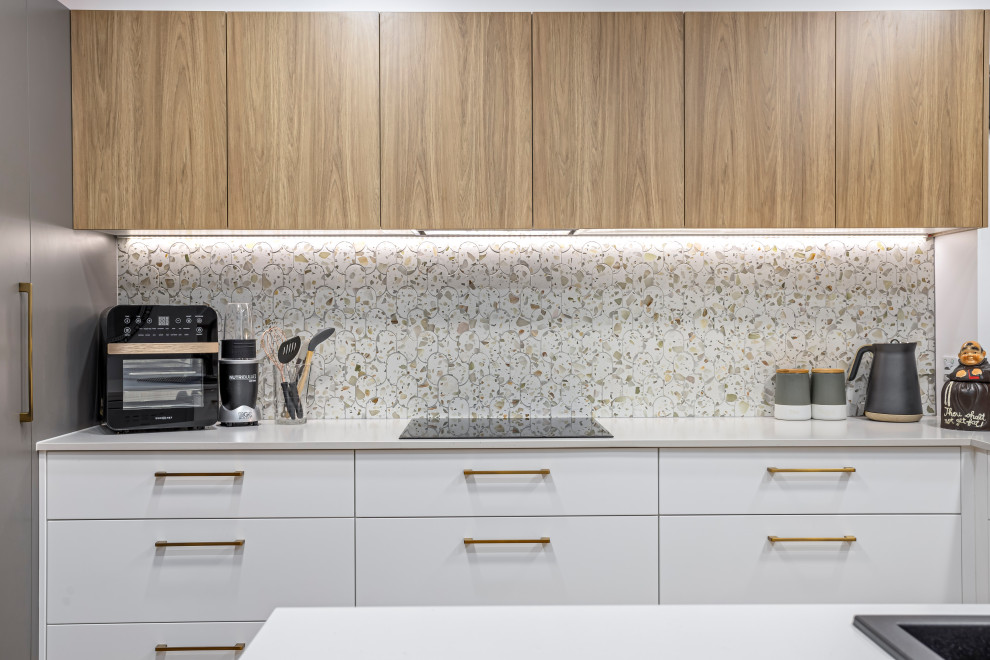 Scandinavian open plan kitchen in Gold Coast - Tweed with medium wood cabinets and quartz benchtops.
