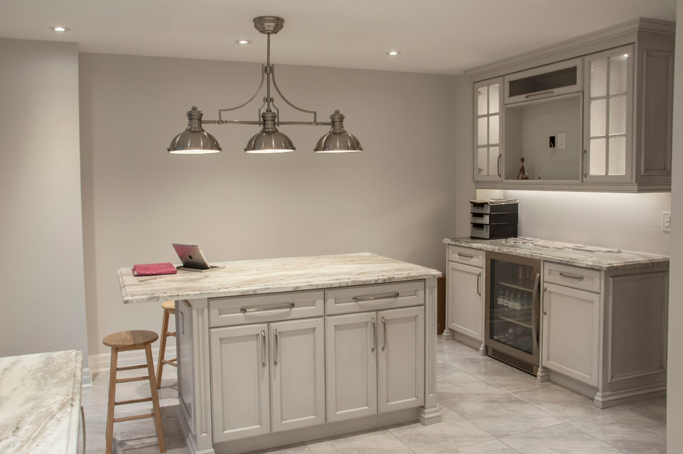 Example of a transitional kitchen design in Toronto