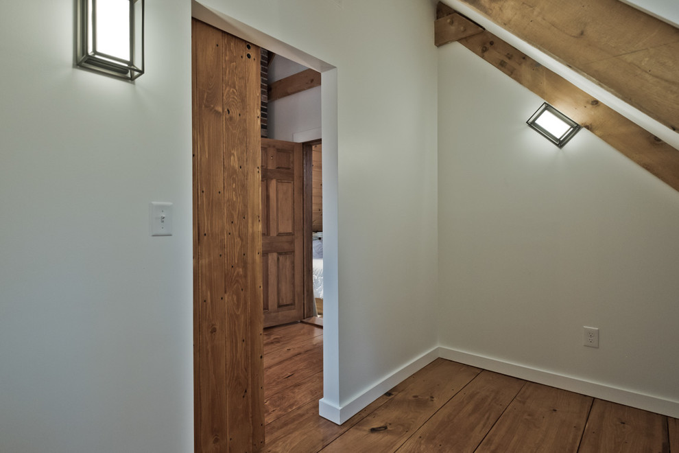 This is an example of a contemporary storage and wardrobe in Portland Maine.