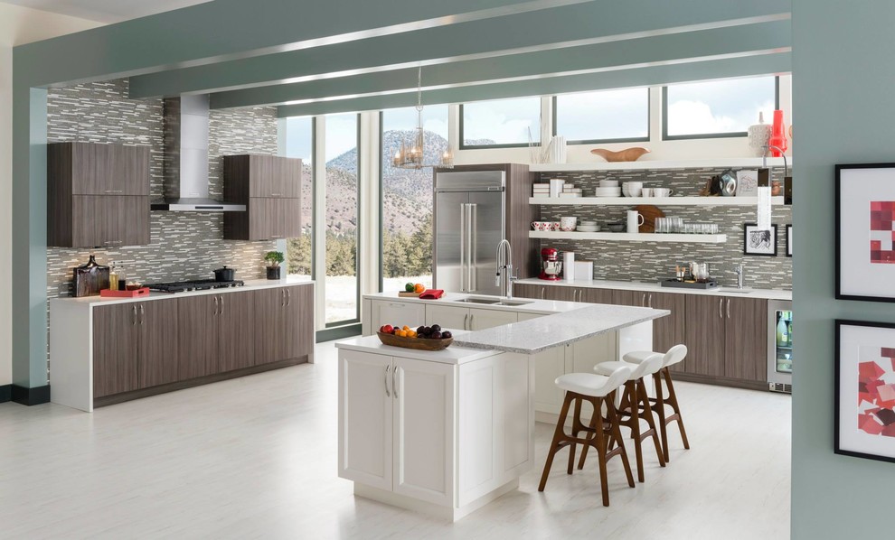 This is an example of a mid-sized contemporary l-shaped eat-in kitchen in Other with an undermount sink, flat-panel cabinets, medium wood cabinets, granite benchtops, multi-coloured splashback, matchstick tile splashback, stainless steel appliances, ceramic floors and multiple islands.