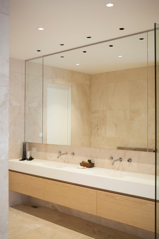 Design ideas for a modern bathroom in Melbourne with an integrated sink.