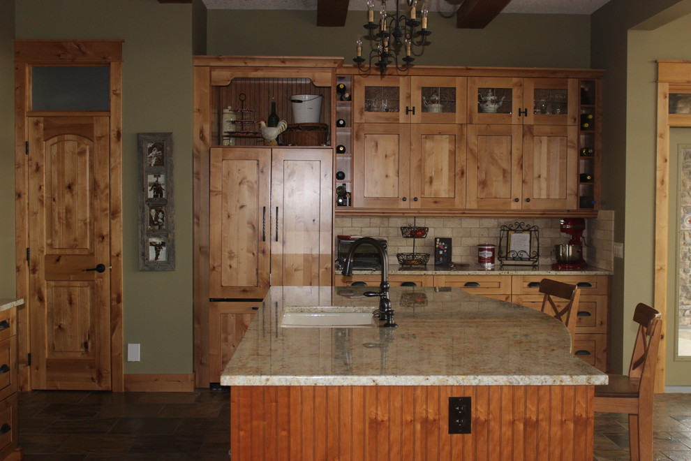 Mountain style home design photo in Calgary
