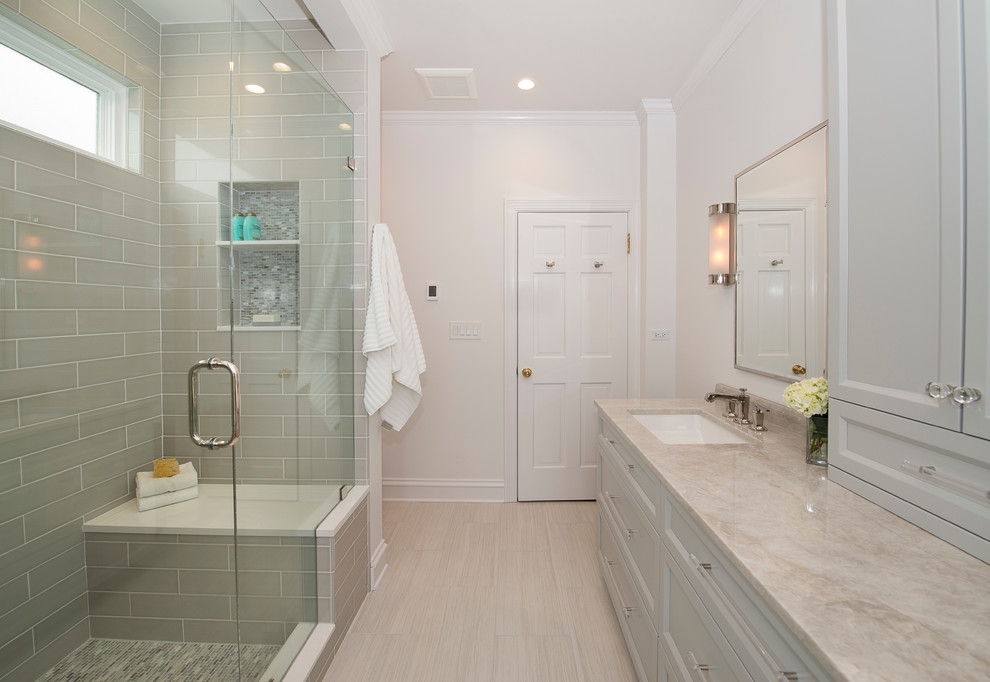 Inspiration for a large transitional master gray tile porcelain tile alcove shower remodel in Chicago with gray cabinets, a one-piece toilet, white walls and an undermount sink