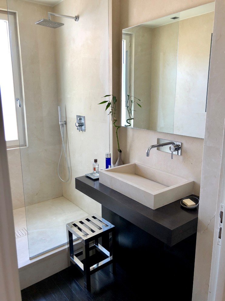 Inspiration for a mid-sized modern 3/4 bathroom in Lyon with a curbless shower, beige tile, marble, beige walls, dark hardwood floors, a trough sink, marble benchtops, brown floor and brown benchtops.