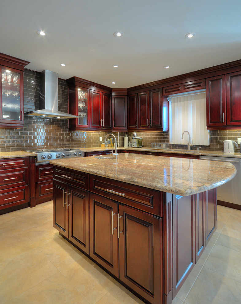 Example of a marble floor kitchen design in Toronto with dark wood cabinets, granite countertops and stainless steel appliances