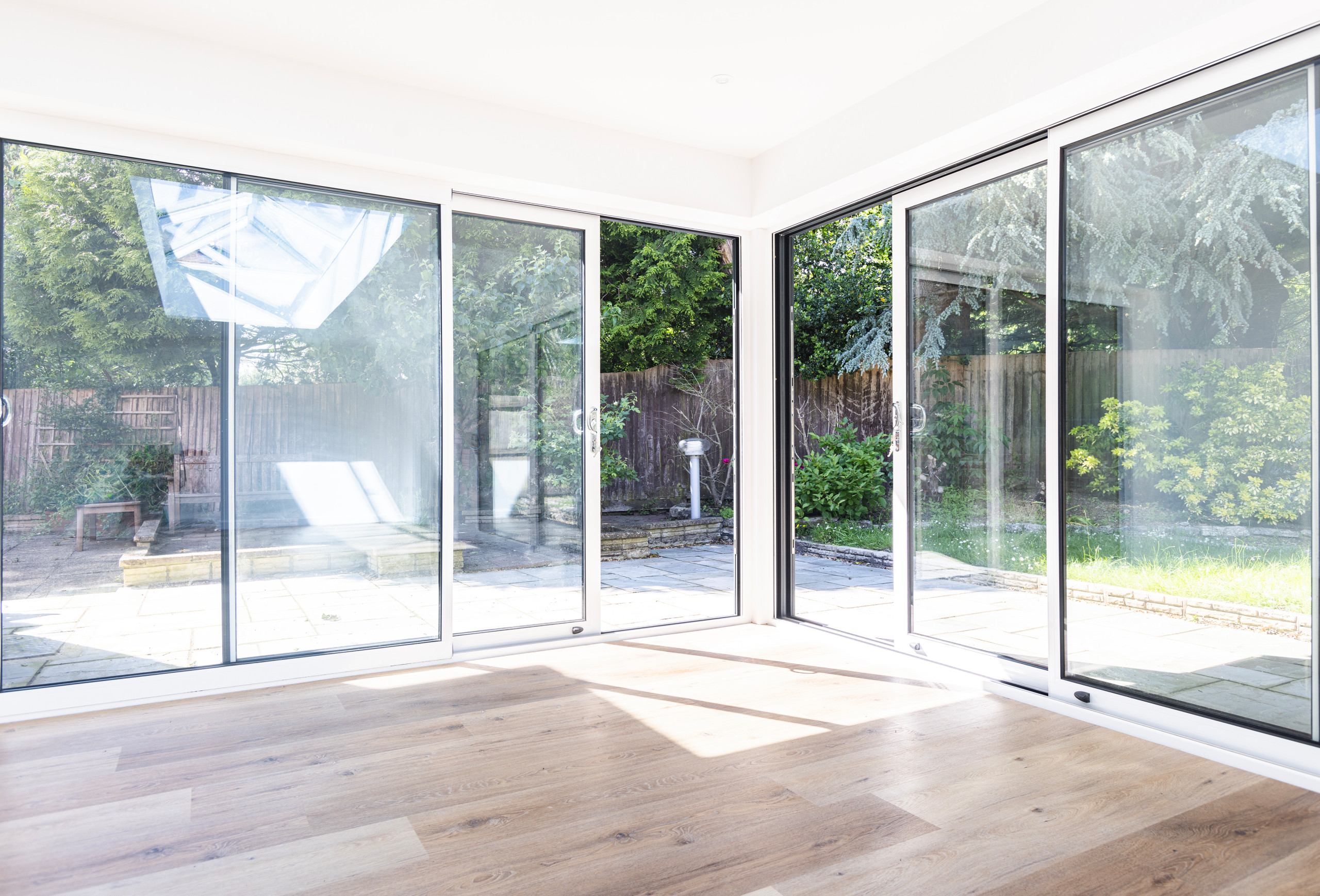 View of sliding doors and garden space from living space