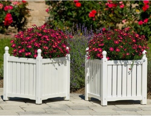 The Solid Wood Lexington Planter Box is a traditionally styled outdoor planter y