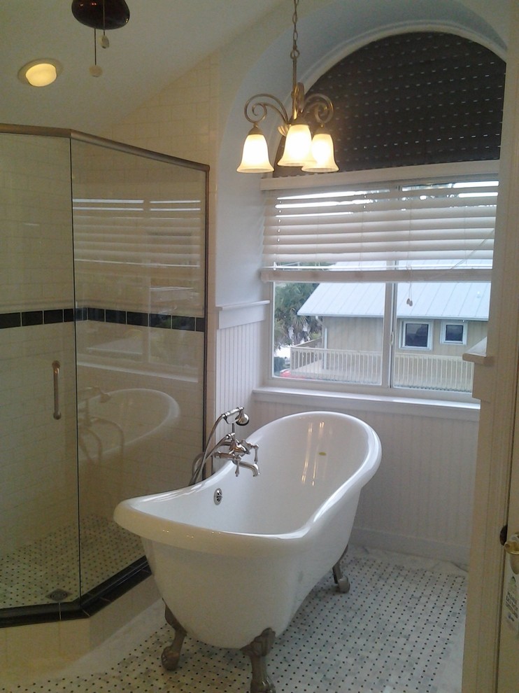 Photo of a country 3/4 bathroom in Orlando with a claw-foot tub, a corner shower, white tile, subway tile, white walls, ceramic floors, white floor and a hinged shower door.