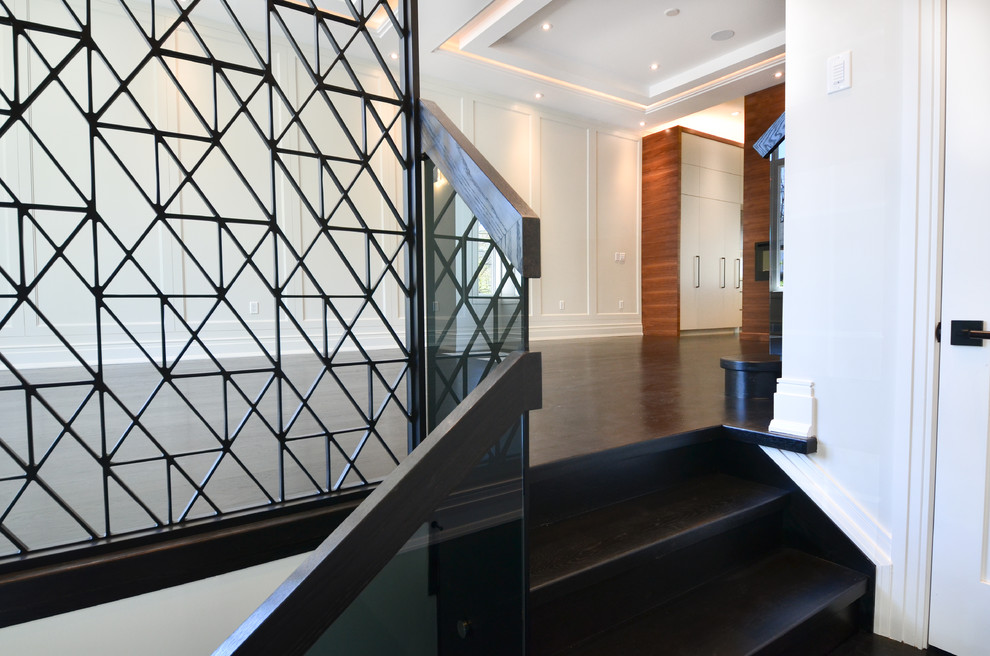 Transitional foyer in Toronto with white walls, marble floors, a single front door, a black front door and grey floor.