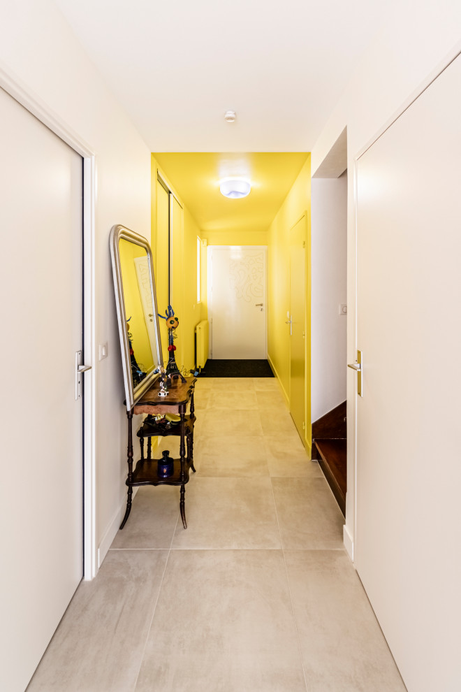 Exemple d'un petit hall d'entrée tendance.