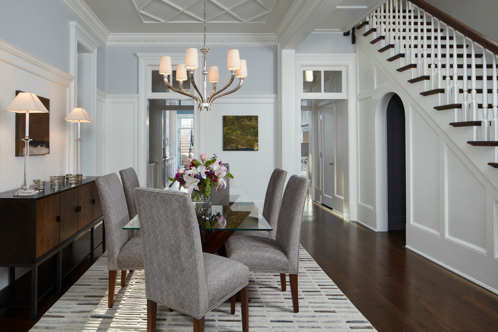 Design ideas for a traditional dining room in Chicago with grey walls and dark hardwood floors.