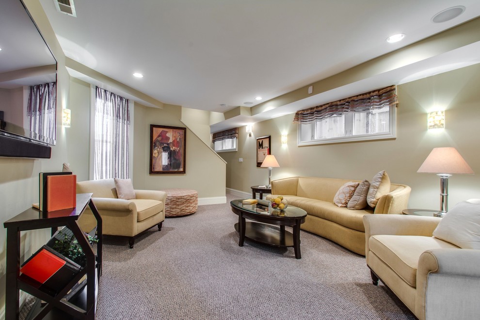 Design ideas for a transitional look-out basement in Chicago with beige walls, no fireplace, carpet and grey floor.