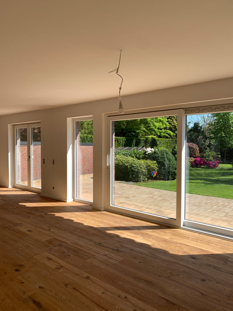 Modernisierung Einfamilienhaus mit Erweiterung der Gauben und  Fensteraufteilung