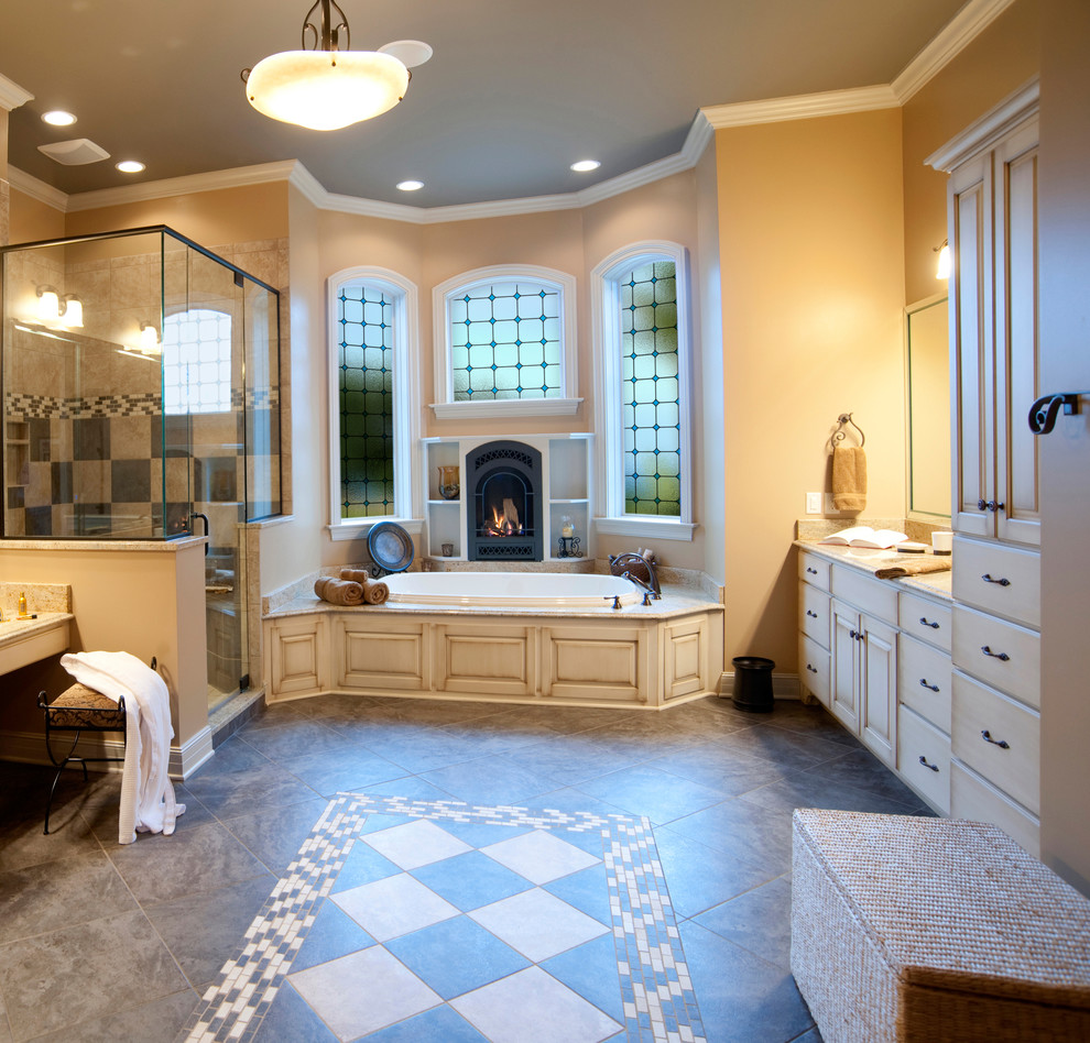 Mid-sized contemporary master bathroom in Cleveland with raised-panel cabinets, dark wood cabinets, a corner tub, an alcove shower, a two-piece toilet, beige tile, ceramic tile, beige walls, ceramic floors, an undermount sink, granite benchtops, multi-coloured floor and a hinged shower door.