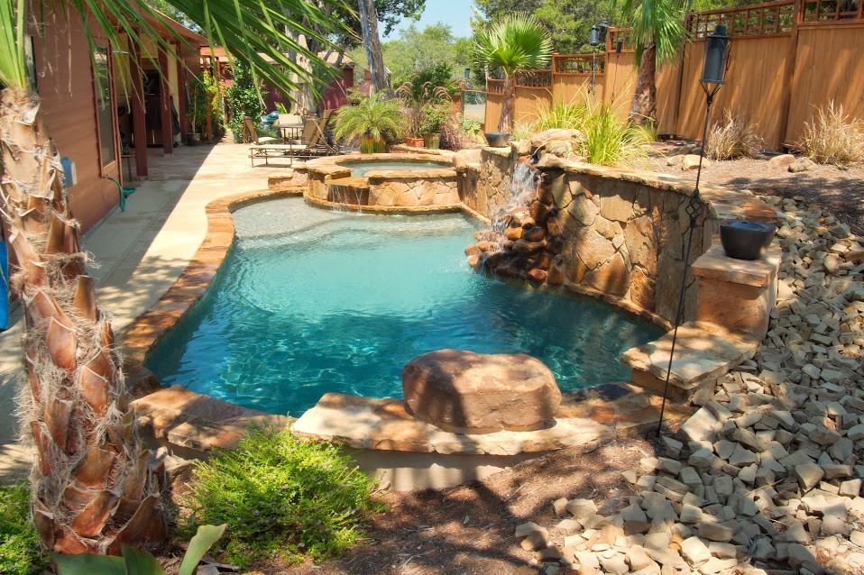 Inspiration for a tropical pool in Austin.