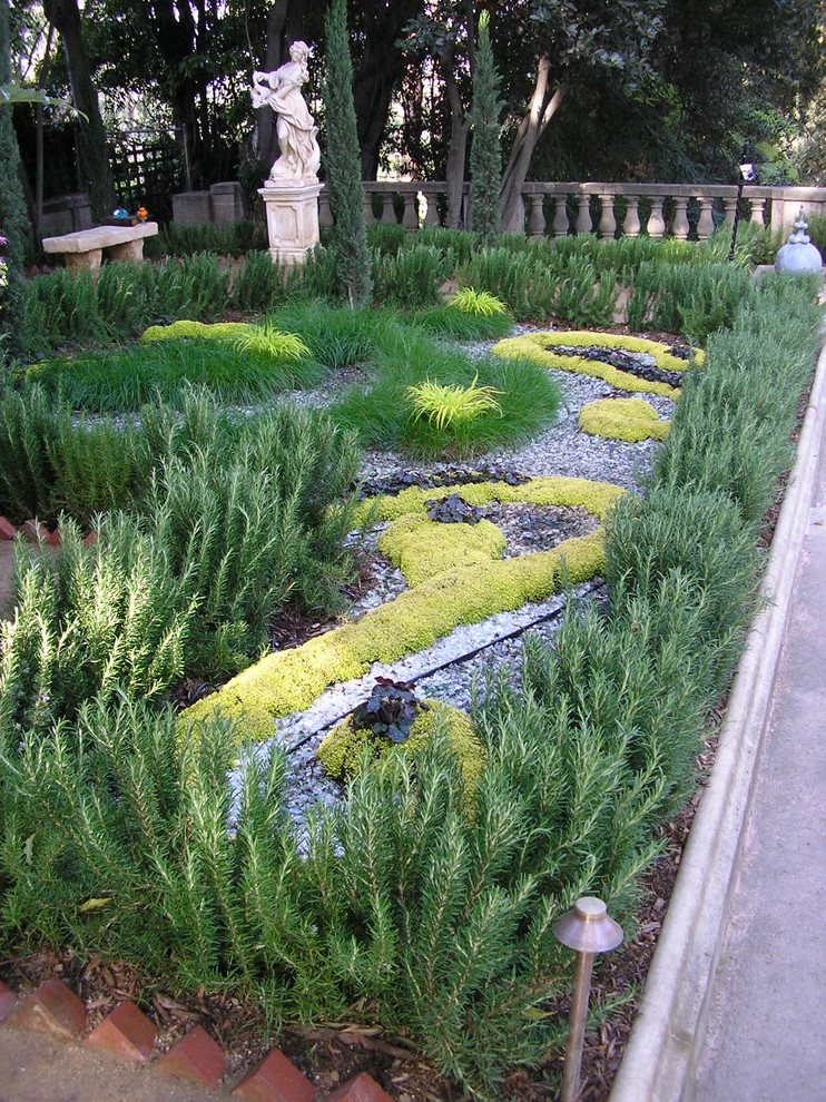 Mid-sized mediterranean backyard formal garden in Los Angeles.