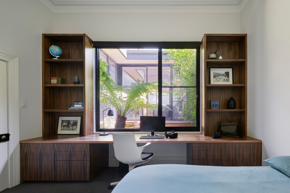Design ideas for a large modern home office in Melbourne.