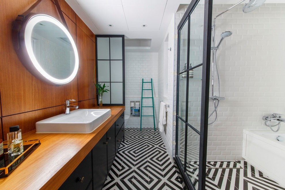 Design ideas for a mid-sized contemporary master bathroom in Hong Kong with flat-panel cabinets, black cabinets, an alcove tub, an alcove shower, white walls, a vessel sink, wood benchtops, multi-coloured floor, an open shower, a wall-mount toilet, white tile, ceramic tile and ceramic floors.