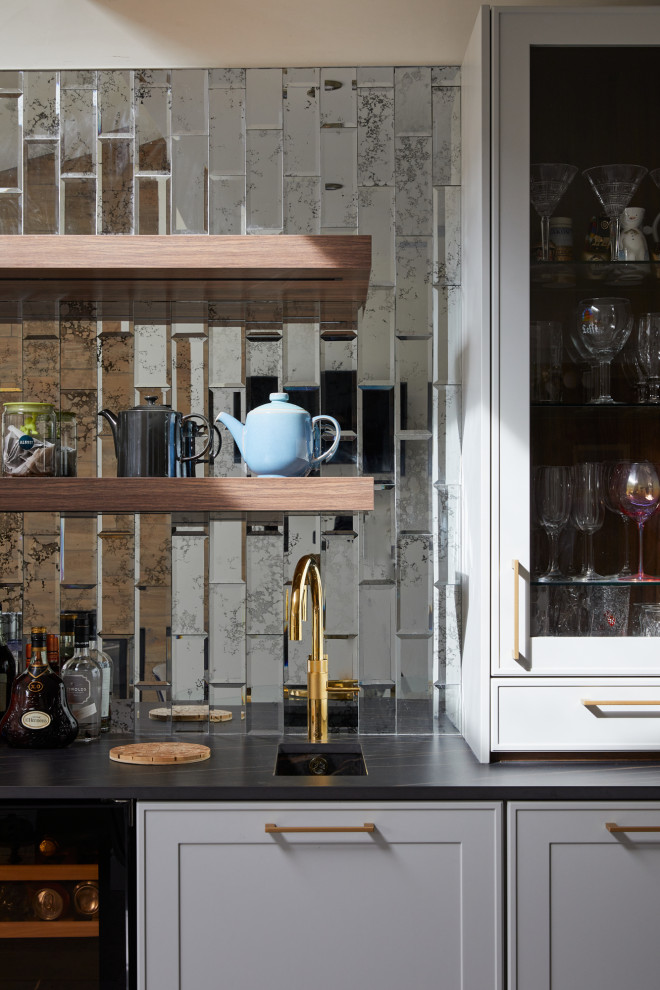 Design ideas for a contemporary home bar in West Midlands.
