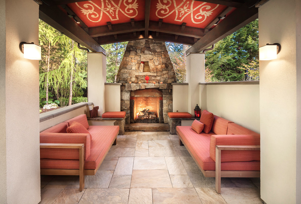 Mediterranean patio in Seattle with a fire feature.