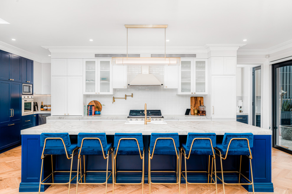 Example of a transitional kitchen design in Sydney