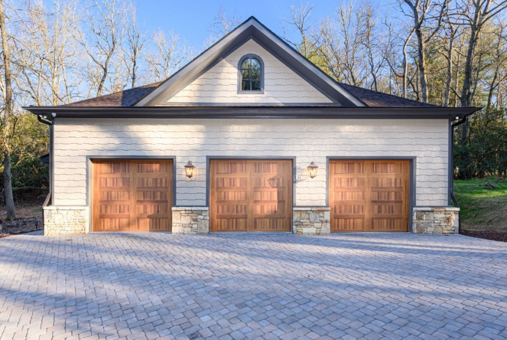 Large transitional detached three-car garage in Other.