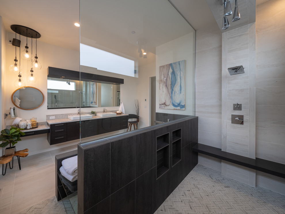 Inspiration for a mid-sized contemporary master bathroom in Portland with flat-panel cabinets, dark wood cabinets, a freestanding tub, a curbless shower, white tile, porcelain tile, white walls, porcelain floors, a vessel sink, engineered quartz benchtops, white floor, an open shower and white benchtops.