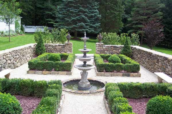 Boxwood Courtyard with fountain.  This garden is still under construction. Its final stage will be a rose garden.
