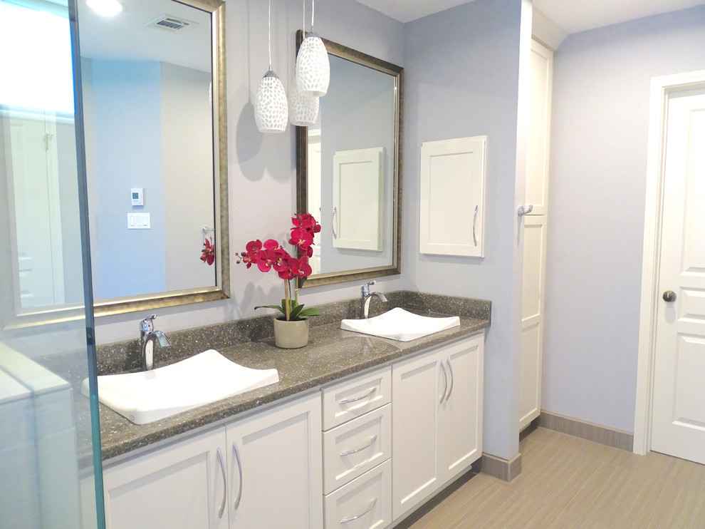 Example of a mid-sized transitional master gray tile and ceramic tile ceramic tile walk-in shower design in Austin with white cabinets, purple walls and quartzite countertops