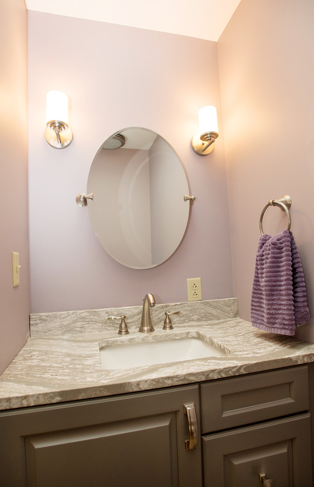 Inspiration for a small transitional 3/4 bathroom in Philadelphia with raised-panel cabinets, grey cabinets, a two-piece toilet, purple walls, vinyl floors, an undermount sink, engineered quartz benchtops and grey floor.