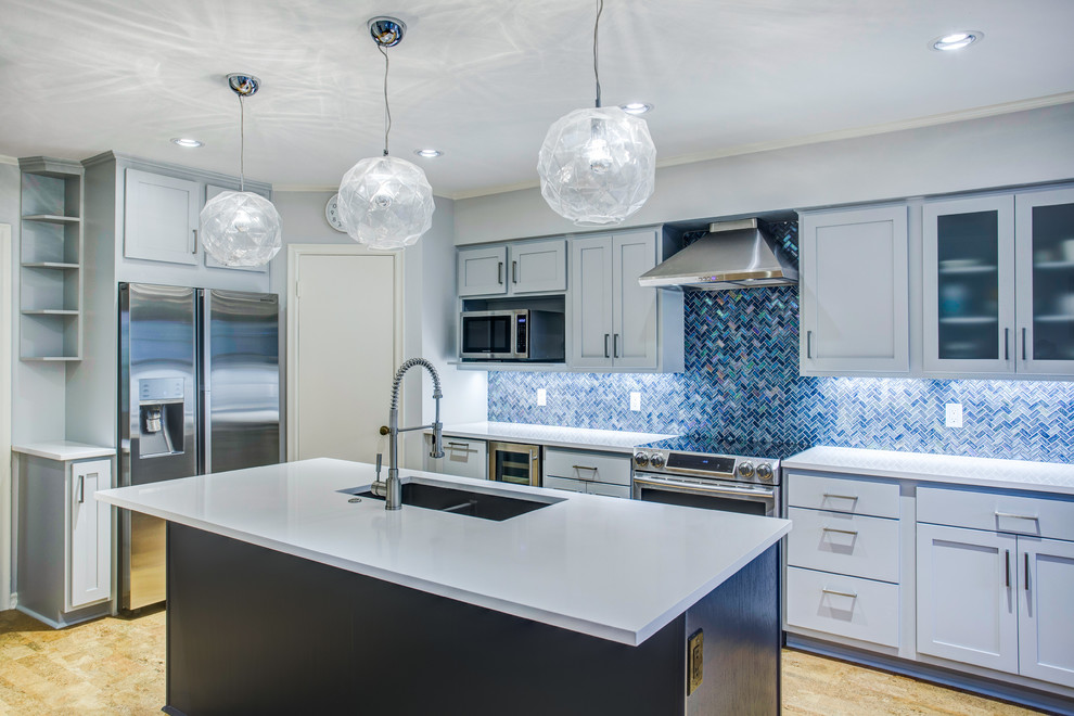 Large transitional l-shaped cork floor and brown floor eat-in kitchen photo in Dallas with an undermount sink, shaker cabinets, blue cabinets, quartz countertops, blue backsplash, mosaic tile backsplash, stainless steel appliances, an island and white countertops