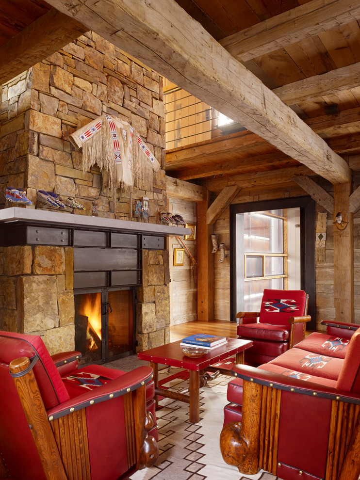 Mid-sized country living room in Salt Lake City with a standard fireplace and a stone fireplace surround.